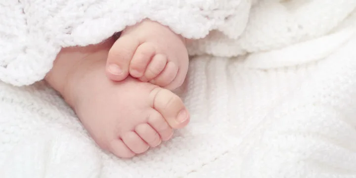 Symbolfoto - Babyfüße Symbolfoto - Babyfüße